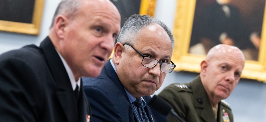 Adm. Michael M. Gilday, chief of naval operations (left), testifies alongside Navy Secretary Carlos Del Torro and Marine Corps Commandant Gen. David H. Berger at a House hearing on May 18, 2022.