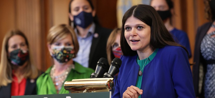 Rep. Haley Stevens (D-MI) speaks during an event with House Democrats and other climate activists.