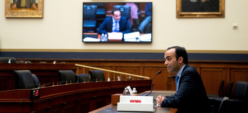Rohit Chopra, Director of the Consumer Financial Protection Bureau, testifies before the House Committee on Financial Services in April. His agency is embarking on an effort to hire a cadre of technologists.