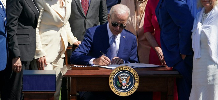 US President Joe Biden signs H.R. 4346, the CHIPS and Science Act of 2022, on the South Lawn of the White House in Washington, DC, on August 9, 2022. 
