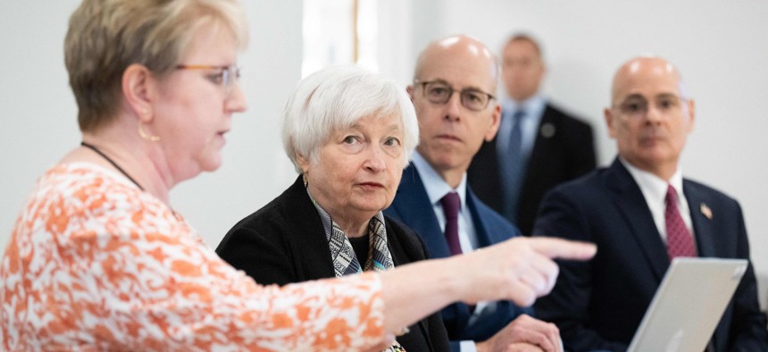 Treasury Secretary Janet Yellen (center) tours an IRS technology workspace in Lanham, Maryland.