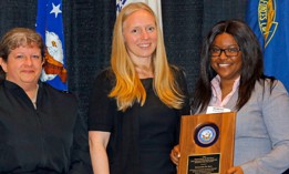 Dr. Kelly Fletcher (center) at the presentation of the DON Information Management/Information Technology (IM/IT) Excellence Award.