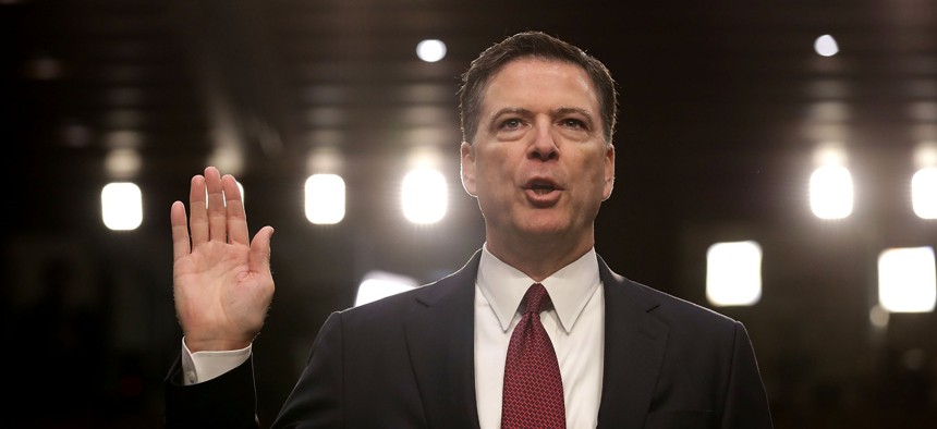 Former FBI Directory James Comey, shown here preparing to testify before Congress in 2017, was unable to change the culture at the bureau to support cyber investigators.