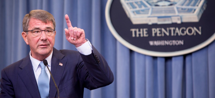 Ash Carter, then secretary of defense, speak briefs reporters in the Pentagon in June 2016.