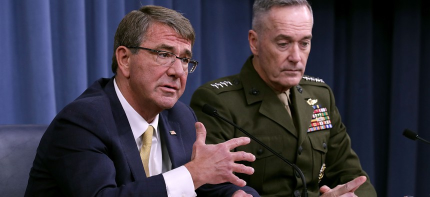 Then Defense Sec. Ashton Carter with Marine Gen. Joseph Dunford Jr. at a press briefing at the Pentagon in January 2017.