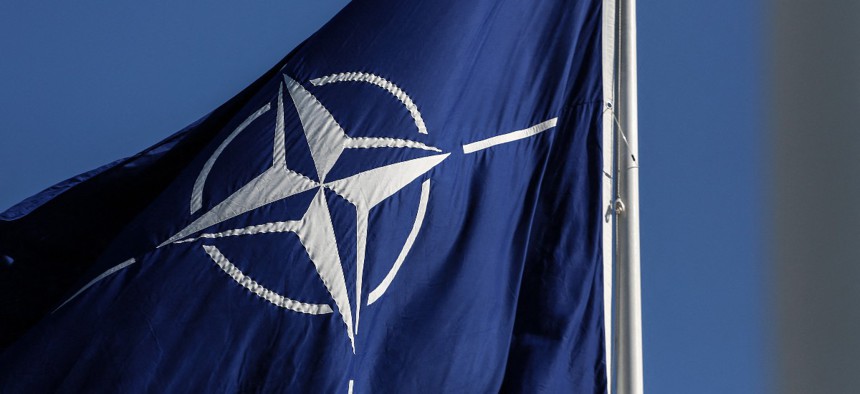 A photo taken on June 15, 2022, shows the North Atlantic Treaty Organization (NATO) flag at the NATO headquarters in Brussels, Belgium.