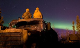 U.S. Marines view the Northern Lights during exercise Arctic Edge on Joint Base Elmendorf-Richardson, Alaska, Mar. 10, 2018.