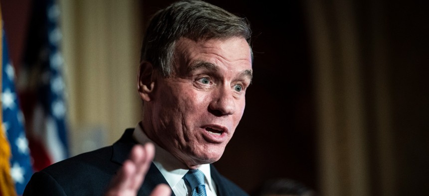 Sen. Mark Warner (D-Va.) discusses the passage of the CHIPs Act on Capitol Hill on July 27, 2022.