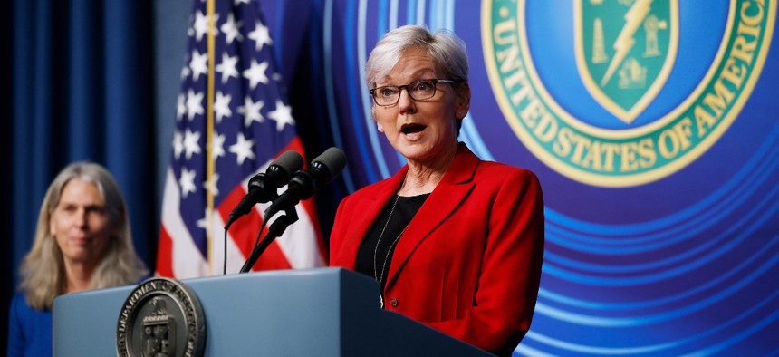 U.S. Energy Secretary Jennifer Granholm (R) is joined by National Nuclear Security Administration head Jill Hruby and other officials for a news conference at the Department of Energy headquarters to announce a breakthrough in fusion research on December 13, 2022 in Washington, DC.