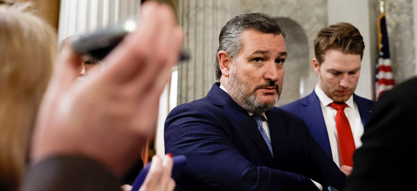 Sen. Ted Cruz (R-TX) speaks with reporters during a series of the votes at the U.S. Capitol Building on February 13, 2023 in Washington, DC.