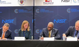  Deputy Secretary of Commerce Don Graves, Under Secretary of Commerce for Standards and Technology and NIST Director Laurie E. Locascio, Maryland Secretary of Commerce Kevin Anderson, and Montgomery County Executive Marc Elrich sign a partnership agreement at the NIST National Cybersecurity Center of Excellence.