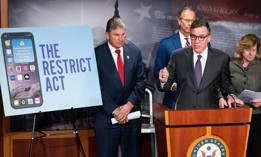 Sen. Mark Warner, D-Va., speaks during the news conference to introduce the Restricting the Emergence of Security Threats that Risk Information Communications Technology Act, or RESTRICT Act, in the Capitol on Tuesday, March 7, 2023. . Warner is flanked from left by Sen. Joe Manchin, D-W. Va., Sen. John Thune, R-S. Dak., Sen. Tammy Baldwin, D-Wisc., and Sen. Michael Bennet, D-Colo. 