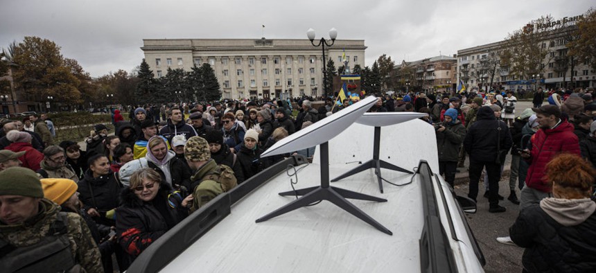 KHERSON, UKRAINE - NOVEMBER 13: Ukrainian forces set up Starlink satellite receivers to provide connection for civilians at Independence Square after the withdrawal of the Russian army from Kherson to the eastern bank of Dnieper River, Ukraine on November 13, 2022. 