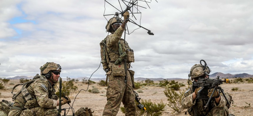2nd Infantry Division soldiers use satellite communication systems at the National Training Center at Fort Irwin, California, on March 10, 2020. 