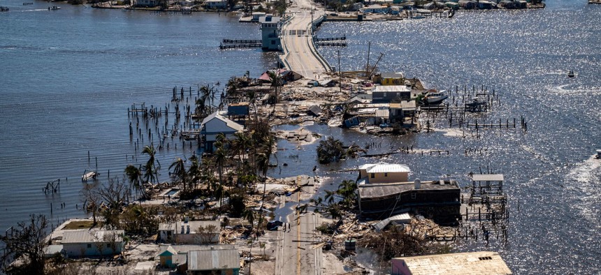 An aerial picture taken on September 30, 2022 shows the only access to the Matlacha neighborhood destroyed in the aftermath of Hurricane Ian in Fort Myers, Florida. NOAA recently announced an update to its model used for predicting storm surge from hurricanes and tropical storms.