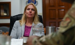 Lauren Knausenberger, Department of the Air Force chief information officer, listens to the 18th Wing mission brief during a visit to Kadena Air Base, Japan, Oct. 3, 2022. Knausenberger said during a May 4, 2023 webinar that the Pentagon’s zero trust effort has created a lot of unity across the services.