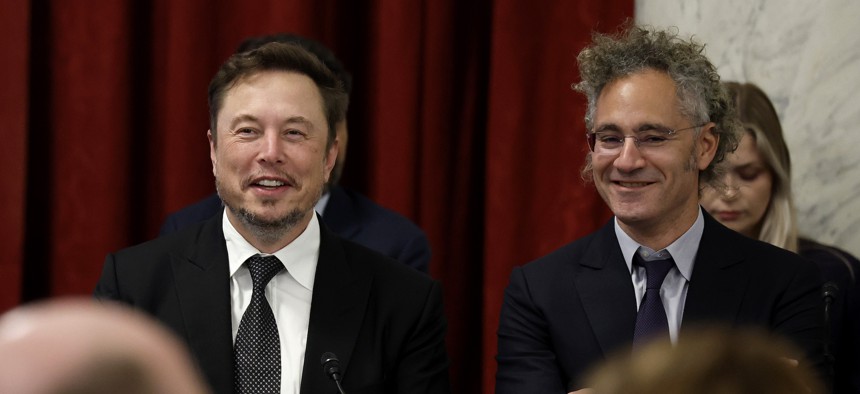 X/Tesla CEO Elon Musk (L) and Palantir CEO Alex Karp attend the Senate's AI Insight Forum on September 13, 2023 