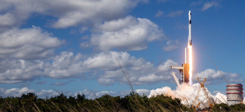 SpaceX’s Falcon 9 rocket with the Dragon spacecraft atop takes off from Launch Complex 39A at NASA's Kennedy Space Center on October 05, 2022 in Cape Canaveral, Florida. 