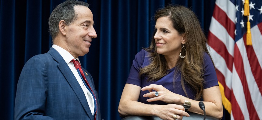 Rep. Nancy Mace, R-S.C., and ranking member Rep. Jamie Raskin, D-Md., chat before a hearing on Sept. 13, 2023. The two lawmakers are sponsors of the Cannabis Users Restoration of Eligibility Act.