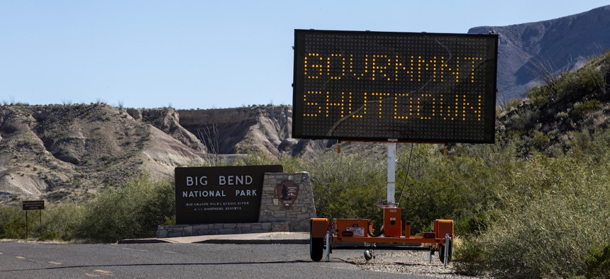 A sign informs visitors driving into Big Bend National Park of the partial government shutdown in 2019.