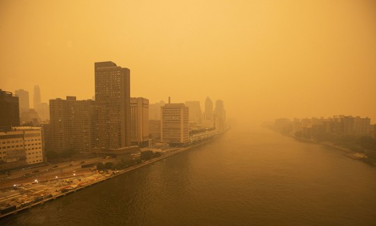 Smoke from Canadian wildfires created hazy conditions over New York City in June 2023. A recent government oversight report says that EPA's air pollution monitoring  IT systems are out of date.