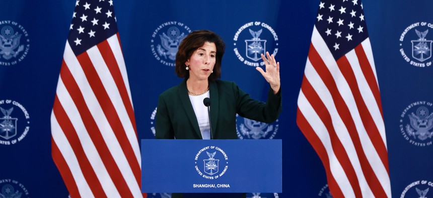 Commerce Secretary Gina Raimondo, shown here on a trip to China in August, warned lawmakers about the risks of a shutdown on the implementation of a law designed to boost domestic semiconductor manufacturing.
