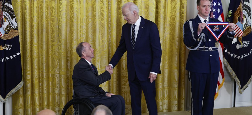 President Joe Biden presents the National Medal of Technology and Innovation to Rory A. Cooper, of the University of Pittsburgh and the U.S. Department of Veterans Affairs, at a White House ceremony on October 24, 2023.