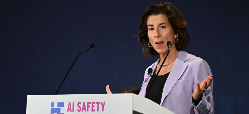 Commerce Secretary Gina Raimondo speaks at the UK's AI Safety Summit in Bletchley Park on Nov. 1, 2023. Her agency is taking a leading role in implementing the Biden administration's executive order on AI.
