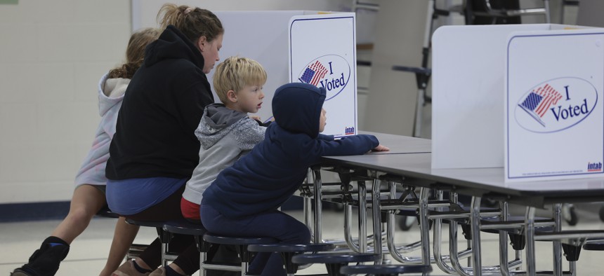 A voter casts a ballot on November 7, 2023 in Haymarket, Va, 