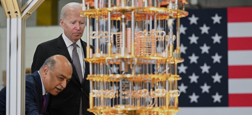 President Biden examines an IBM quantum computer during a tour of a company facility in Poughkeepsie, New York in Oct. 2022.