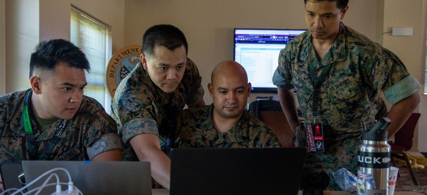Reserve Marines with DCO-IDM Company B and the newly created Marine Innovation Unit participated in Cyber Yankee as the "red team," simulating a cyberspace attack against a power utility grid. 