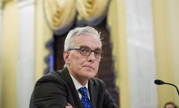 VA Secretary Denis McDonough, shown here at a 2021 hearing, will have to keep Congress up-to-date on progress on the agency's multibillion health record refresh as a condition of obtaining necessary funding.