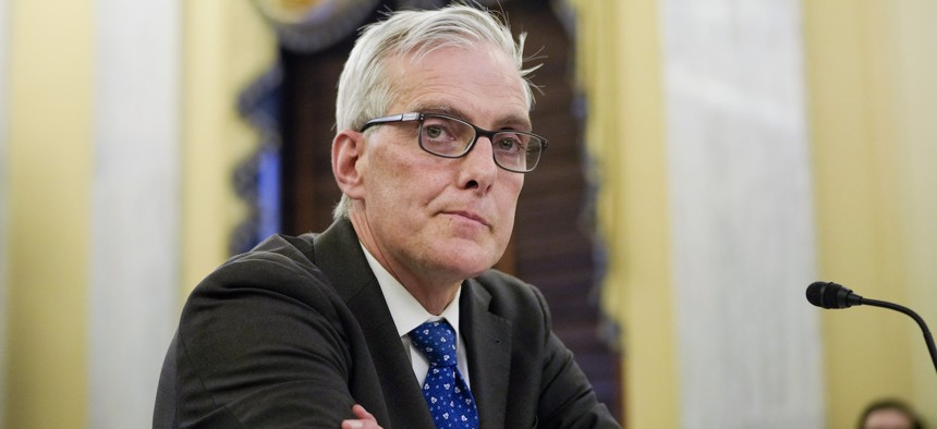 VA Secretary Denis McDonough, shown here at a 2021 hearing, will have to keep Congress up-to-date on progress on the agency's multibillion health record refresh as a condition of obtaining necessary funding.