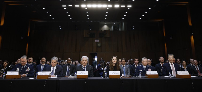 Intelligence officials prepare to brief members of the Senate Select Committee on Intelligence at the annual Worldwide Threats hearing on March 11, 2024.