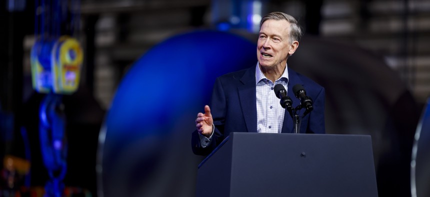 Colorado Democrat Sen. John HIckenlooper, shown here speaking at a Nov. 2023 event in his home state, is gathering support for a policy to regulate generative AI.