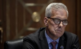 VA Secretary Denis McDonough, shown here at a 2022 hearing, says new deployments of the agency's commercial health record software will resume next fiscal year.