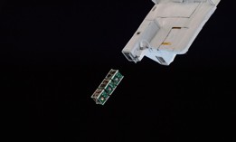 A close-up view of a BIRDS-2 satellite deployment in August 2018.