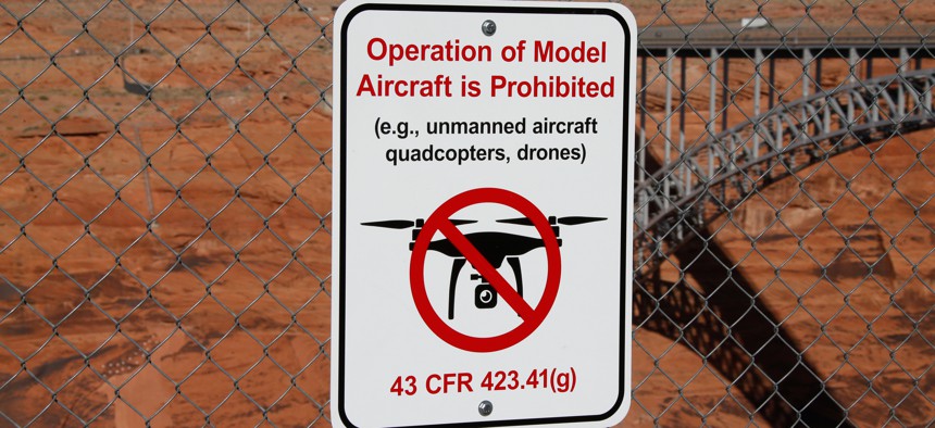 A sign announcing a ban on drone flights near the Glen Canyon Dam Bridge in Page, Arizona.