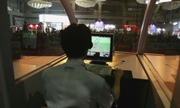 A player competes in the China Korea Cyber Game 2005 in Beijing, China.