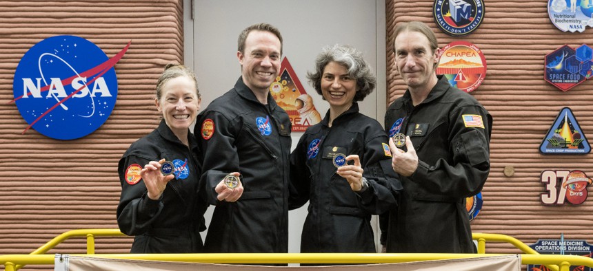 The CHAPEA crew egress from their simulated Mars mission July 6, 2024, at NASA’s Johnson Space Center in Houston. From left: Kelly Haston, Nathan Jones, Anca Selariu, and Ross Brockwell.
