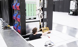 A technician works on the the installation of the Venado supercomputer at Los Alamos National Laboratory. 