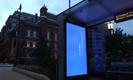 A sign in a Washington, D.C. bus shelter shows the Microsoft reboot blue screen four days after a faulty Crowdstrike update caused a worldwide technology outage. Experts say the impact would have been more widely felt in U.S. schools if it had occurred during the academic year.