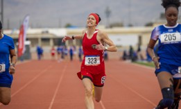 U.S. Marine Corps Maj. Ashley Christman, an athlete with Team Marine Corps, competes in the track competition during the 2024 Air Force and Marine Corps Trials on Nellis Air Force Base, Nevada, March. 12, 2024.