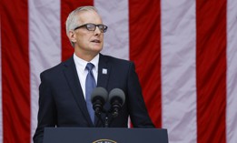 U.S. Veterans Affairs Secretary Denis McDonough gives remarks at a National Veterans Day Observance ceremony in the amphitheater of the Arlington National Ceremony