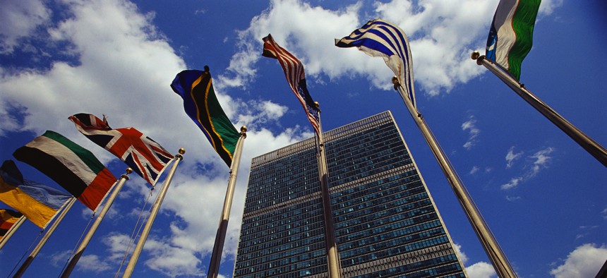 Flags fly outside the General Secretariat Building at the United Nations Headquarters.