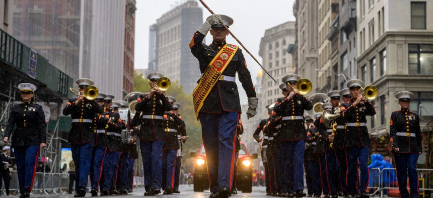 Members of the U.S. Marine Band marches during the annual Veterans Day Parade in New York City on November 11, 2022. A new Department of Veterans Affairs program is trying to help veterans avoid a proliferation of scams targeting former servicemembers.