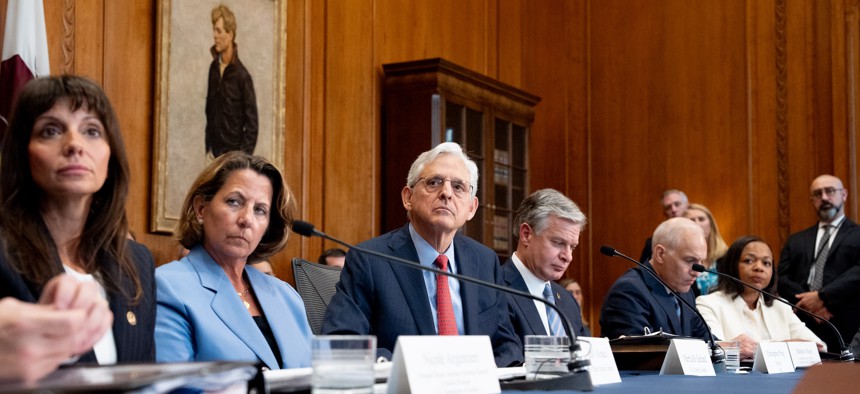 Attorney General Merrick Garland (C) accompanied from left, Principal Deputy Assistant Attorney General Nicole Argentieri, head of the Justice Department's Criminal Division, Deputy Attorney General Lisa Monaco, Garland, FBI Director Christopher Wray, and U.S. Assistant Attorney General for the National Security Division Matt Olsen. On Wednesday, the Election Threats Task Force disclosed a Russia-led influence campaign to sway the U.S. presidential election. Intelligence officials confirmed the findings of the task force in a media briefing.