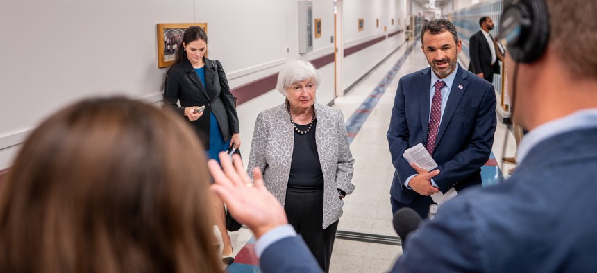 Treasury Secretary Janet Yellen and IRS Commissioner Danny Werfel take questions from reporters on a tour of a tax processing facility in Austin, Texas.