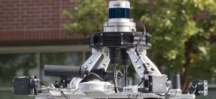 Hesai Technology's LiDAR is seen on top of a WeRide self-driving car in San Jose, California in 2020. A House bill would restrict the use of taxpayer funds to acquire China-made LiDAR gear by the Transportation Department.