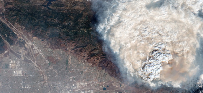 Satellite view of smoke plumes from the ongoing Line Fire in the Angeles National Forest, Calif. NASA, IBM and Oak Ridge National Laboratory teamed up on a foundational AI weather model trained on 40 years of historical weather data.